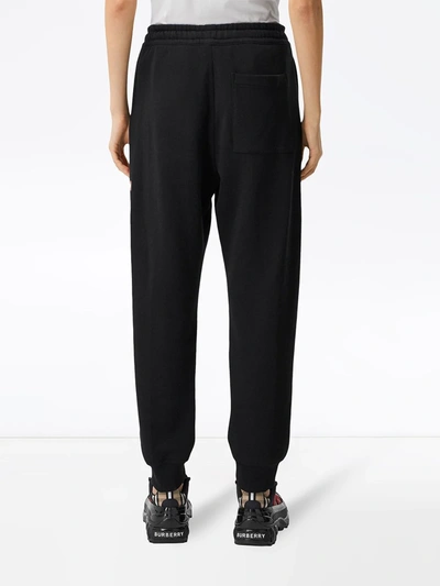 Shop Burberry Logo Print Track Pants In Black