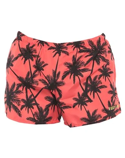 Shop Yes I Am Swim Trunks In Coral