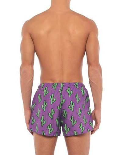 Shop Yes I Am Man Swim Trunks Purple Size Xl Polyester