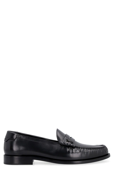 Shop Saint Laurent Calfskin Loafers In Black