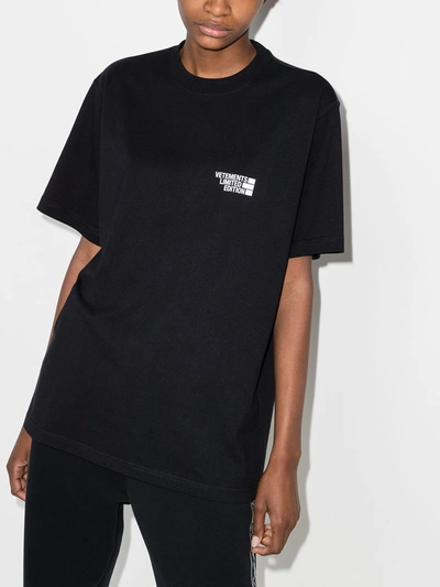 Shop Vetements Logo-print Cotton T-shirt In Black