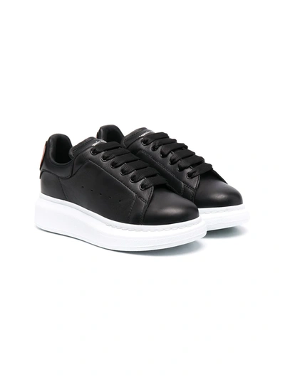 Shop Alexander Mcqueen Oversized Low-top Sneakers In Black