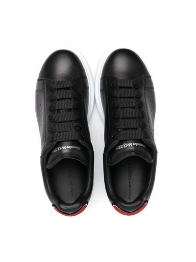 Shop Alexander Mcqueen Oversized Low-top Sneakers In Black