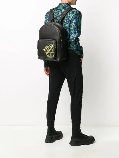 Shop Versace Leather Backpacks In Black