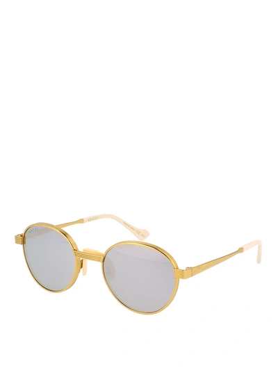 Shop Gucci Round Metal Sunglasses In Gold