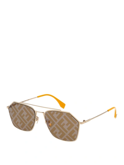 Shop Fendi Eyeline Sunglasses In Gold