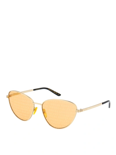 Shop Gucci Metal Cat-eye Sunglasses In Gold