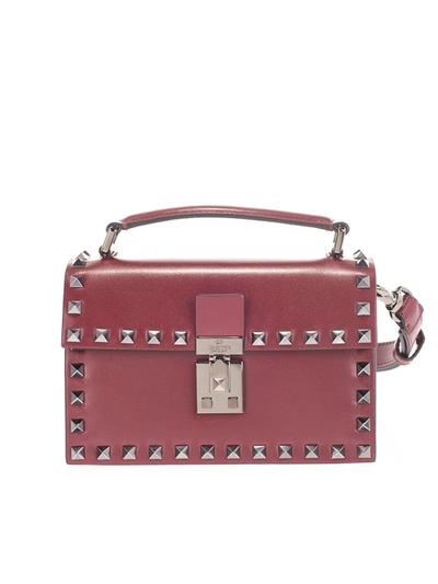 Shop Valentino Rockstud Shoulder Bag In Burgundy In Red