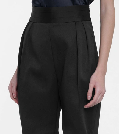 Shop Khaite Connelly High-rise Tapered Pants In Black