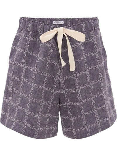 Shop Jw Anderson All-over Logo Print Shorts In Blue
