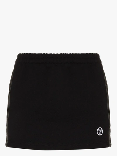 Shop Vetements Logo Side Tape Mini Skirt In Black