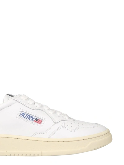 Shop Autry Leather Sneakers In White