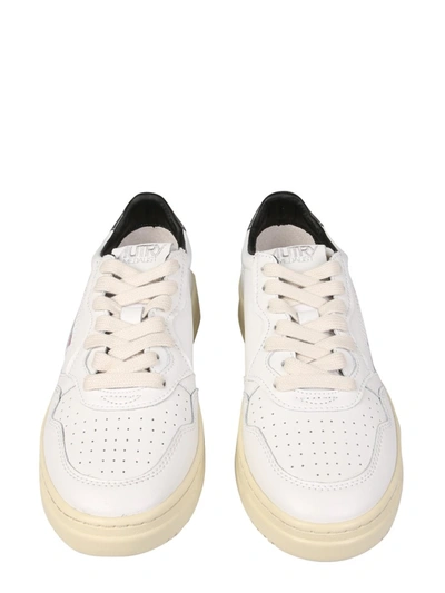 Shop Autry Leather Sneakers In White