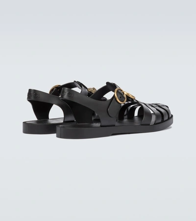 Shop Gucci Rubber Buckle Strap Sandals In Black