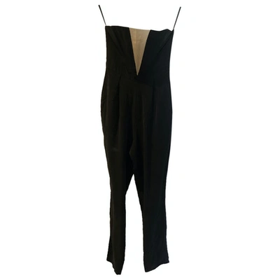 Pre-owned Zimmermann Black Silk Jumpsuits