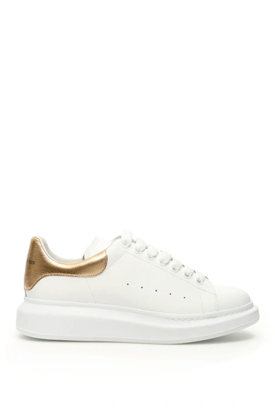 Shop Alexander Mcqueen Oversize Sneakers In White/gold