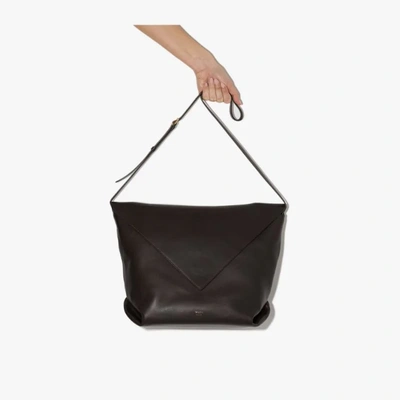 Shop Khaite Brown Maude Leather Cross Body Bag