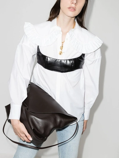 Shop Khaite Brown Maude Leather Cross Body Bag