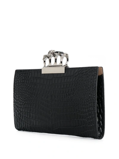 Shop Alexander Mcqueen Four Ring Skull Leather Clutch In Black