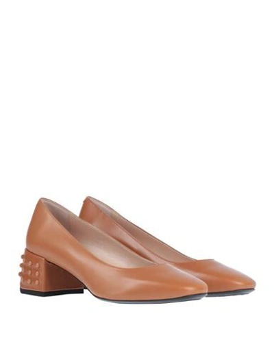 Shop Tod's Pumps In Tan