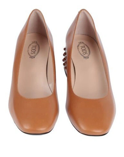 Shop Tod's Pumps In Tan