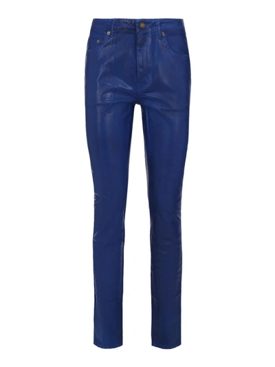 Shop Saint Laurent Coated Cotton Skinny Jeans In Blue