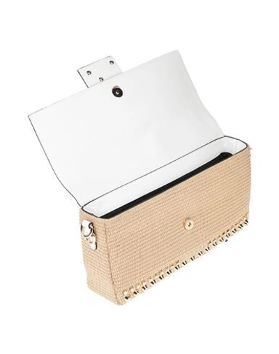 La Carrie Handbags In White