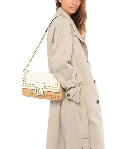 La Carrie Handbags In White