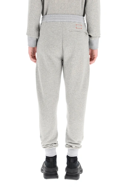 Shop Alexander Mcqueen Sweatpants With Logo Embroidery In Pale Grey