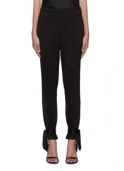 Shop Alice And Olivia Ramora' Tie Hem Straight Leg Jogger Pants In Black