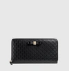 GUCCI Bow Microguccissima Leather Zip Around Wallet