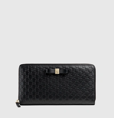Shop Gucci Bow Microssima Leather Zip Around Wallet In Punctuated