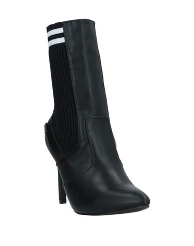 Shop Romeo Gigli Ankle Boots In Black