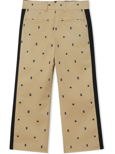 Shop Burberry Star Monogram-motif Trousers In Brown