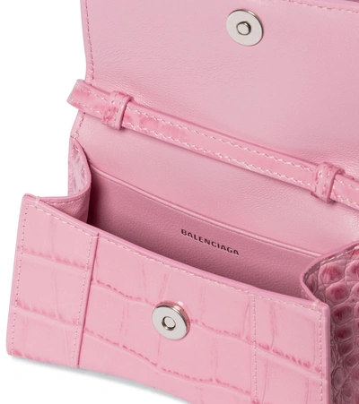Shop Balenciaga Hourglass Mini Leather Crossbody Bag In Pink