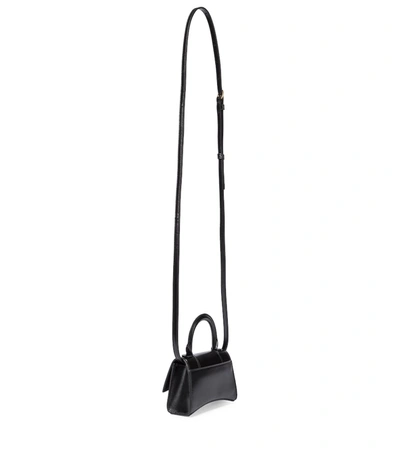 Shop Balenciaga Hourglass Mini Leather Crossbody Bag In Black