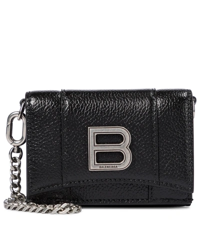 Shop Balenciaga Hourglass Mini Leather Wallet In Black