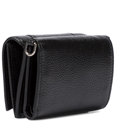 Shop Balenciaga Hourglass Mini Leather Wallet In Black