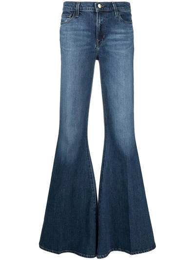 Shop J Brand Ultra Flared Jeans In Blue