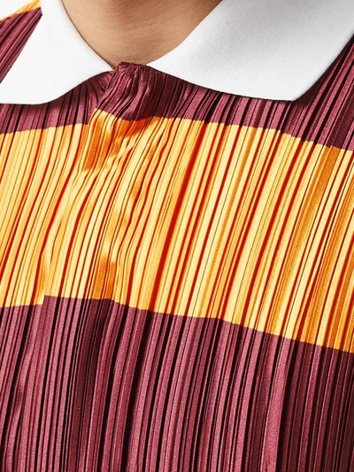 Shop Burberry Striped Plissé Polo Shirt In Orange