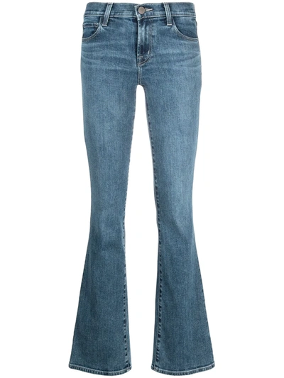 Shop J Brand Mid-rise Flared Jeans In Blue