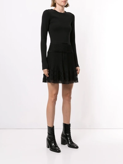 Shop Alexis Iris Pleated Mini Dress In Black