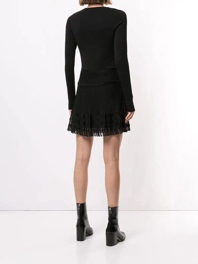Shop Alexis Iris Pleated Mini Dress In Black