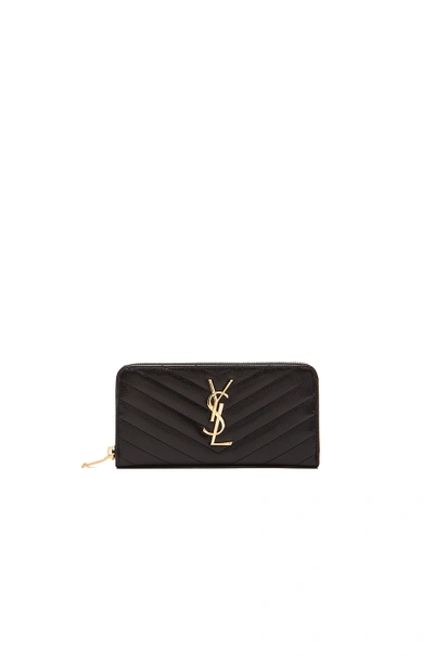 Shop Saint Laurent Monogramme Zip Around Wallet In Black