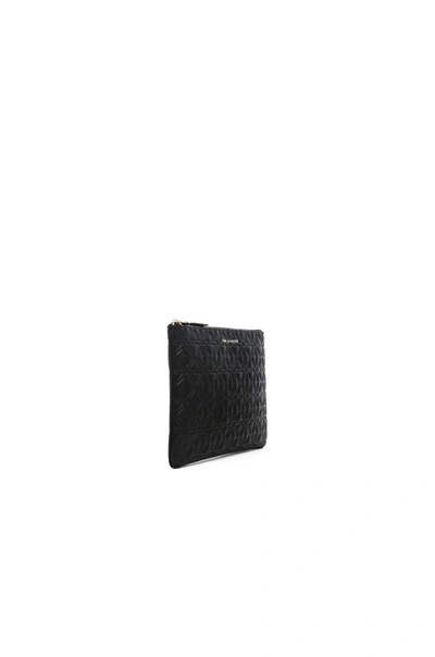 Shop Comme Des Garçons Comme Des Garcons Star Embossed Pouch In Black, Geometric Print.