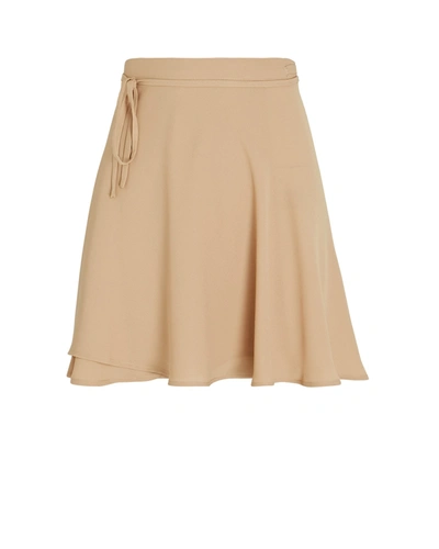 Shop Sara Cristina Marino Mini Crepe Wrap Skirt In Beige