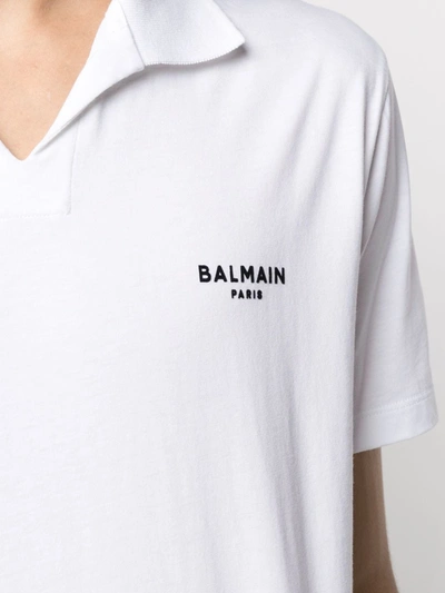 Shop Balmain Flocked Logo Polo Shirt In White