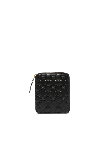 Shop Comme Des Garçons Clover Embossed Zip Fold Wallet In Black