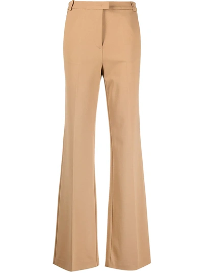 Shop Pinko Scuba-effect Flared Trousers In Brown