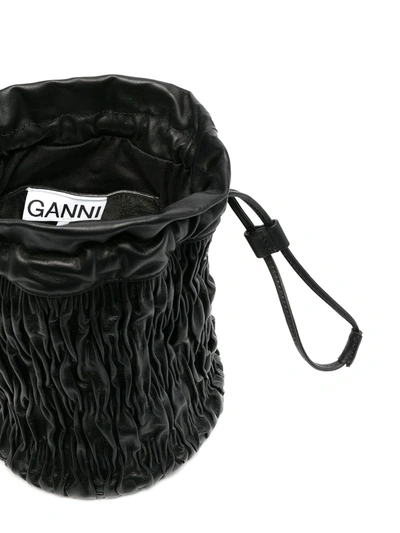 Shop Ganni Matellasé Drawstring Pouch In Black